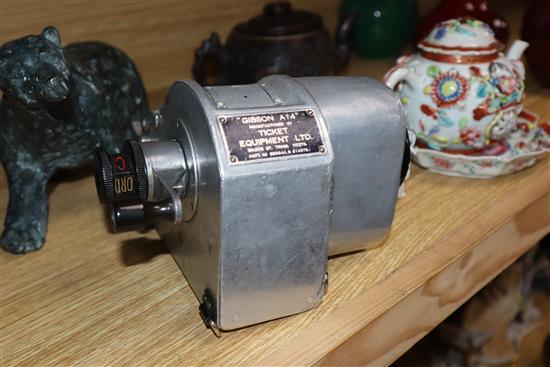A Gibson A14 London bus ticket machine and a Swedish AB Almex ticket machine, both in fitted leather cases